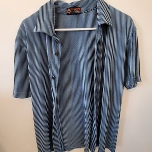 Blue button down shirt. Trippy pattern